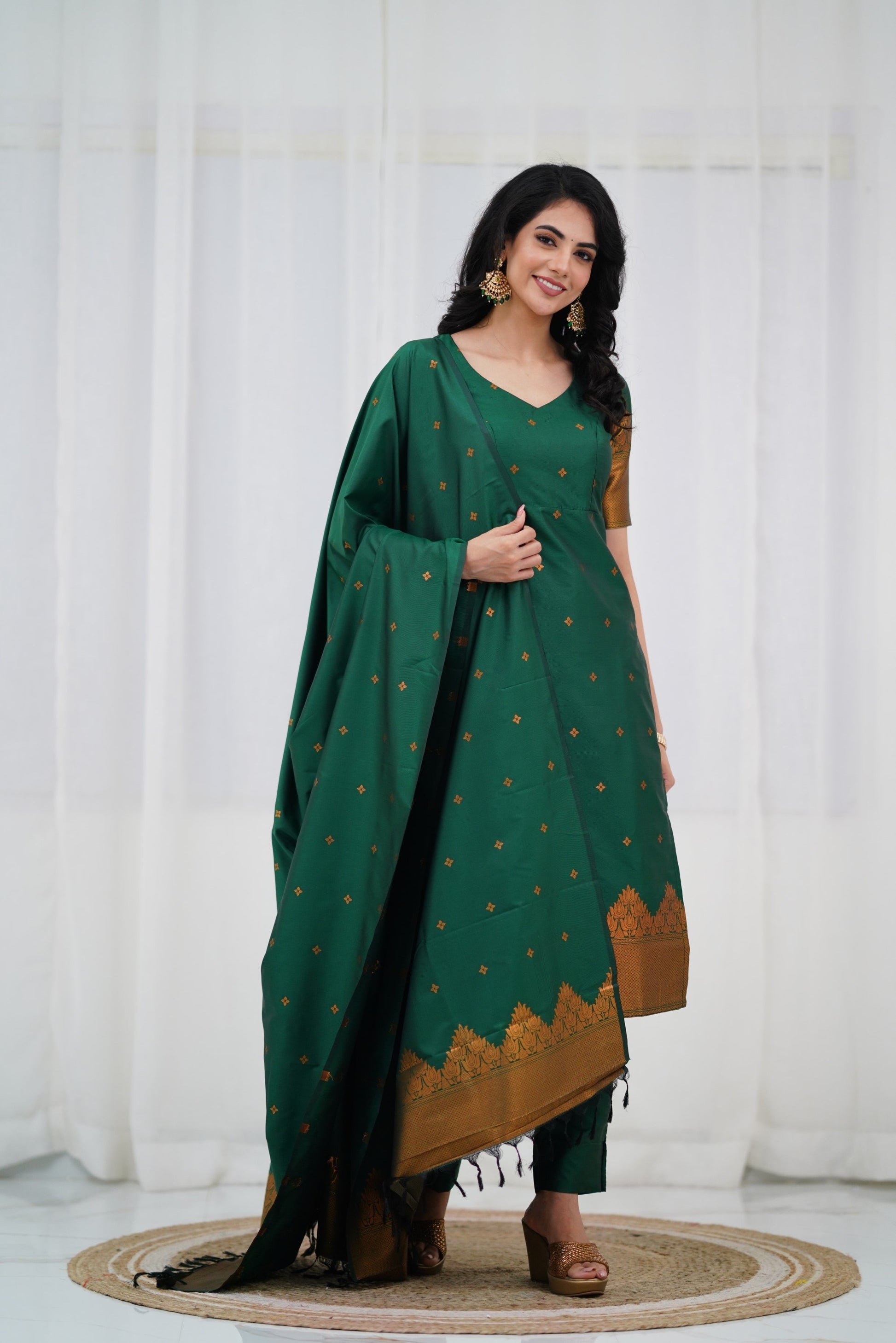 Bottle Green Straight Fit Kurta Pant Set in Blended Silk with Intricate Golden Zari Detailing