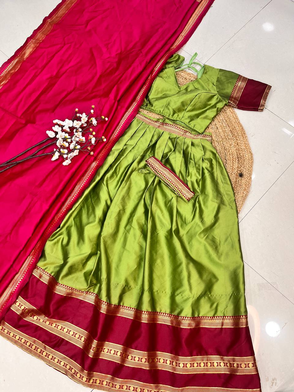 A green lehenga with dupatta is a beautiful, sophisticated ensemble that embodies both tradition and elegance